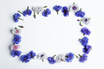 Frame made of bluett flowers isolated on white