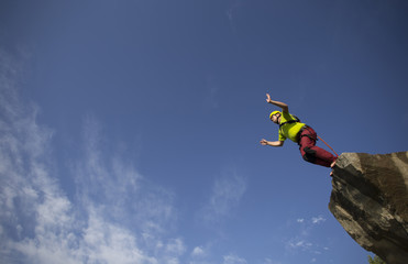 Jump off a cliff.