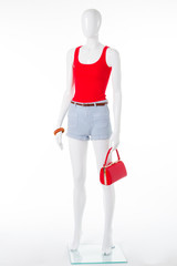 Summer red tank top, denim shorts and handbag.
