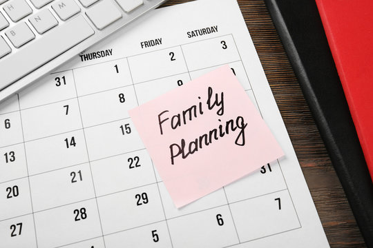 Note with text FAMILY PLANNING, closeup