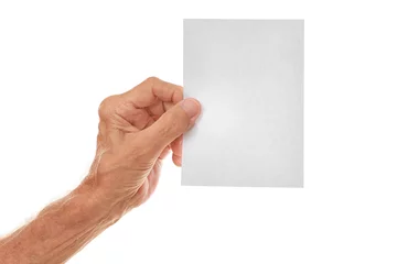 Old man hand holding sheet of paper on a white background