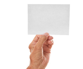 Obraz premium Old man hand holding sheet of paper on a white background