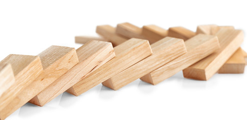Wooden dominoes on white background