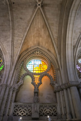 Fototapeta premium Detail of stained glass window and Nave Ceiling in the interior of cathrdral of Cuenca, Spain