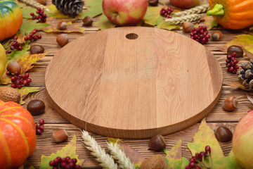 Autumn leaves, apples, pumpkins and nuts