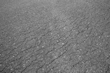 Asphalt background texture with some fine grain in it background
