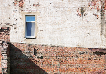 red brick and plaster on the old wall texture background.