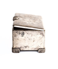 Old silver metallic retro casket over white background