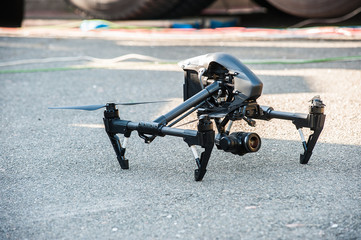 Professional drone  with camera/Drone with professional camera on ground.Selective focus