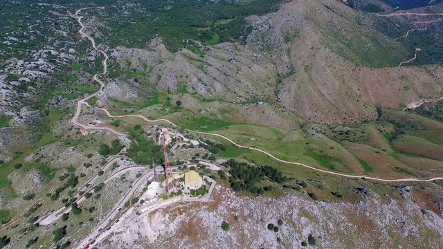 Mount Pantokrator Corfu top mountain summit Greece aerial 4k video. Peak communications technology station.
