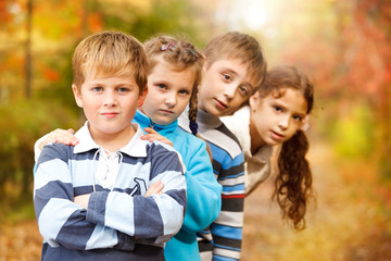 Fototapeta premium Children in autumn park