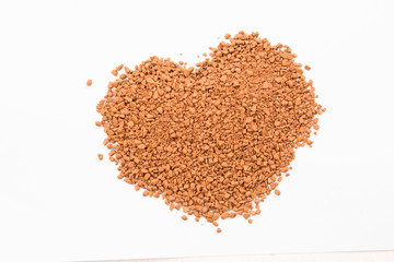 Heart shape pile of instant coffee