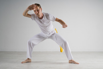 Man practicing Capoeira , brazilian martial Art.