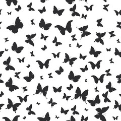butterflies set isolated silhouette seamless pattern on white background. Vector