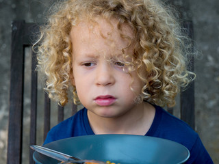 boy refusing to eat