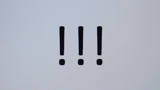 Somebody prints exclamation mark on a computer