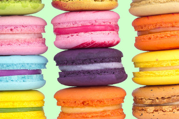 multicolor macaron on pastel light green color background.