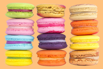 multicolor macaron on pastel Cream color background.