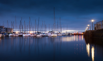 Fototapeta na wymiar Early morning lights on the River Tawe and Swansea Marina
