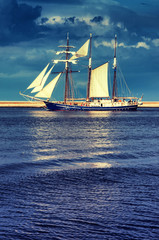 Fototapeta na wymiar Yacht sailing on the calm baltic