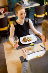 Young couple in restaurant