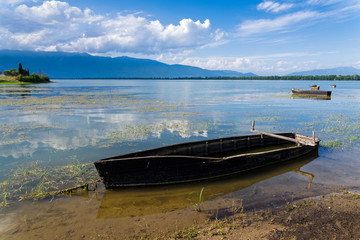 Obraz premium Traditional wooden boats in Kerkini lake, Greece
