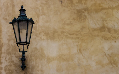 Old street lantern lamp on wall. Copy space