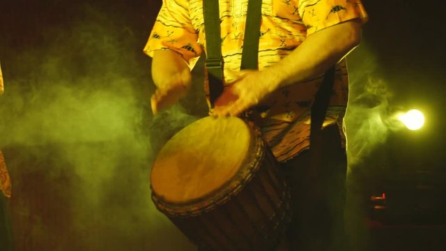 Man playing hand drums