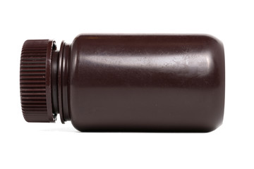 Fototapeta premium Medicine bottle of brown glass or Plastic isolated on white background, 