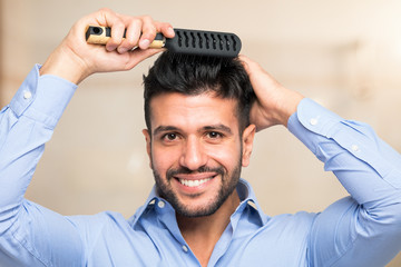 Man taking care of his hair