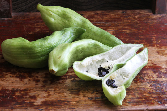 Whole and Half Caigua Fruit with Seeds
