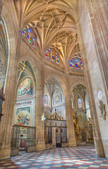 Fototapeta na wymiar SEGOVIA, SPAIN, APRIL - 14, 2016: The gothic vault and side chapels in Cathedral of Our Lady of Assumption with the neoclassicistic frescoes.