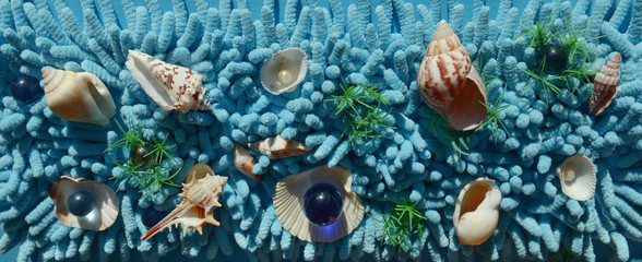 Sea shell  abstract design on a textured turquoise blue backgrou