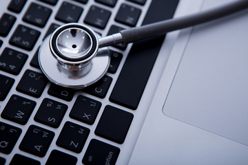 stethoscope on laptop