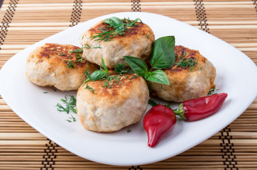 Plate with fried meatballs minced chicken with red pepper