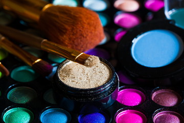 Cosmetics. eye shadow multicolour, brushes