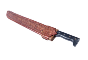 Old Machete Knife in an Ornate Brown Leather Case Isolated on White.
