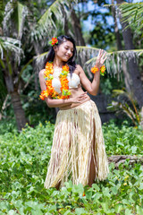 Hawaii hula dancer dancing in the tropical nature