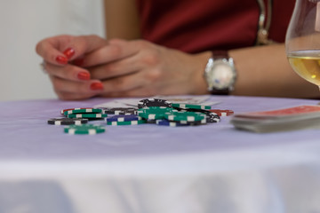 casino chips on white table