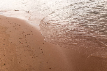 sandy shore of the sea as a backdrop