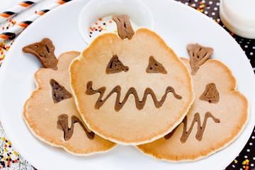 Fun pumpkin pancakes for Halloween holiday party