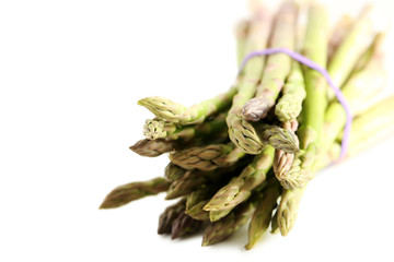 Fresh green asparagus isolated on a white