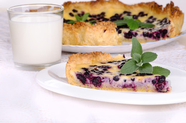 Berry pie with a glass of milk