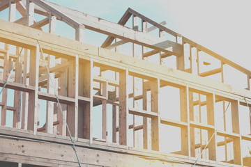 new house construction interior with exposed framing, photograph