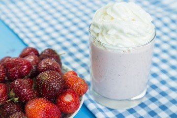 Strawberry milkshake with whipped cream