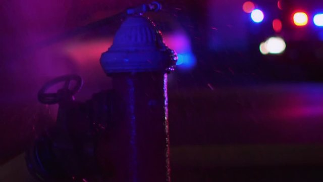 slow motion fire hydrant with connected hose