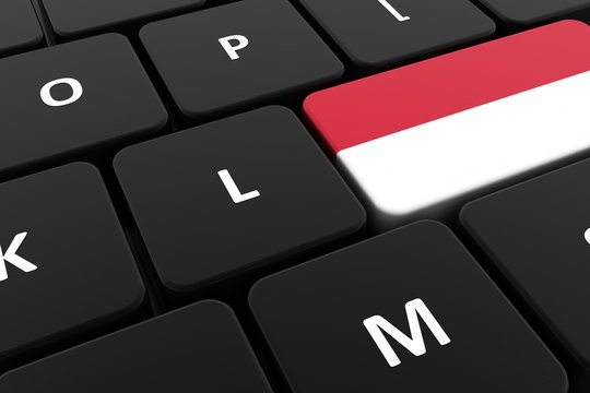Computer keyboard, close-up button of the flag of Indonesia. 3D render of a laptop keyboard