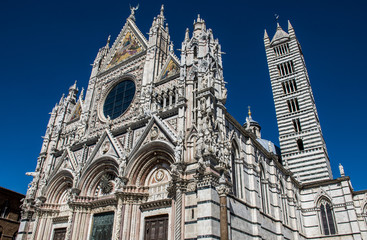 Big historic marble Cathedral in the city of Siena in the Tuscany