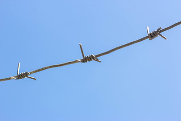 Barbed wire in the sky