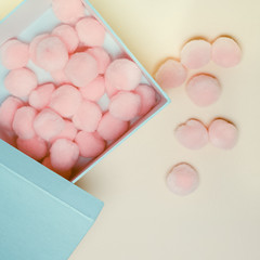 Plush balls in the box. Minimalism art